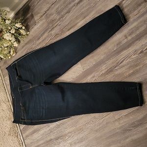 NWOT Dark denim 5 pocket pull on jeans adorned with rhinestones.